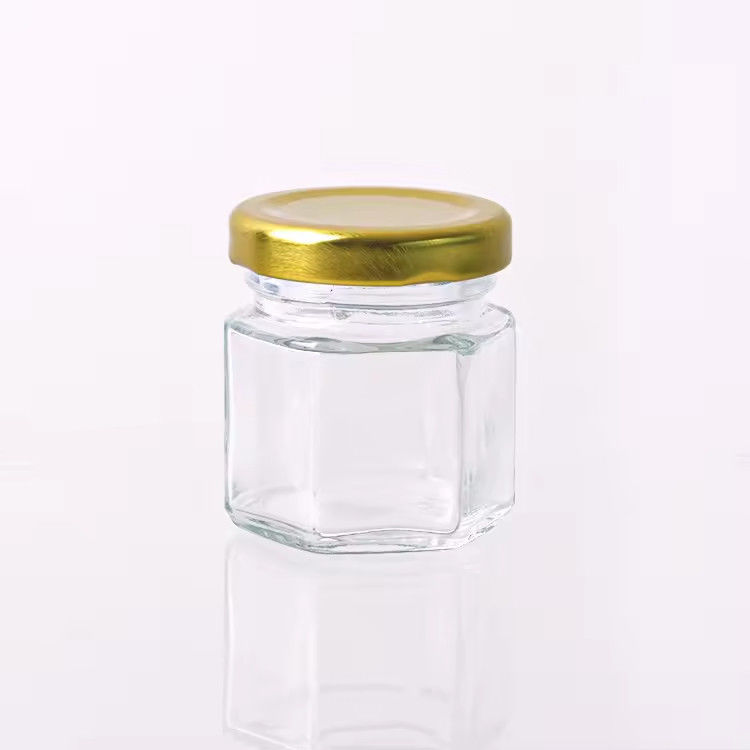 কাস্টম লেবেল হেক্সাগন আকৃতি 100ml 180ml 380ml মধু গ্লাস জার জন্য অলিভ ফলের জ্যাম