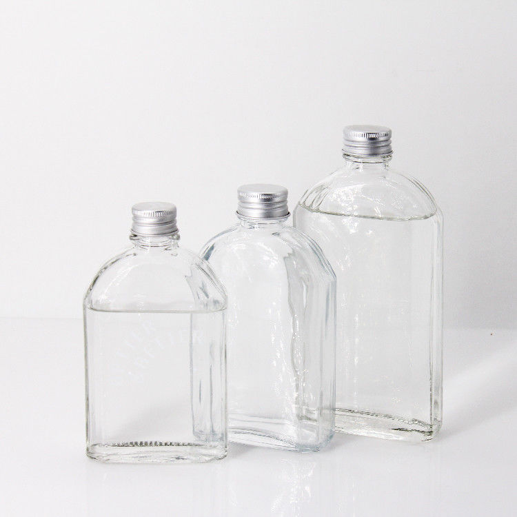 নতুন ডিজাইন 200Ml 250Ml 300Ml স্বচ্ছ মদ গ্লাস ফ্ল্যাট বোতল স্ক্রু ঢাকনা সঙ্গে